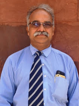 Dr. Mahesh Bundele